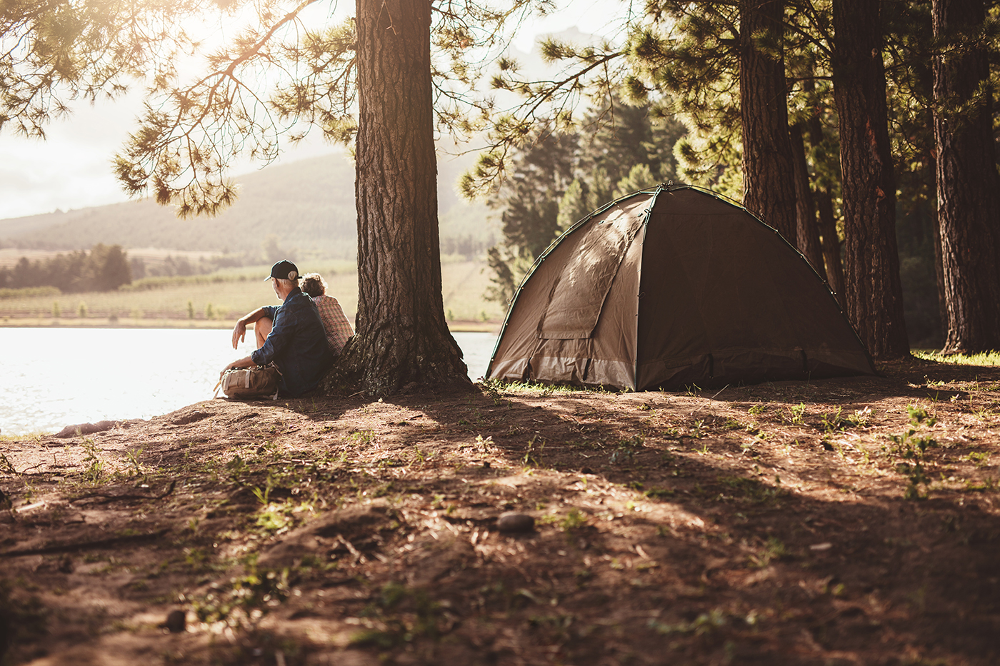 https://www.lakescouleeoutdoorsblog.com/wp-content/uploads/2023/11/mature-couple-camping-by-a-lake-2021-08-26-19-58-16-utc.jpg